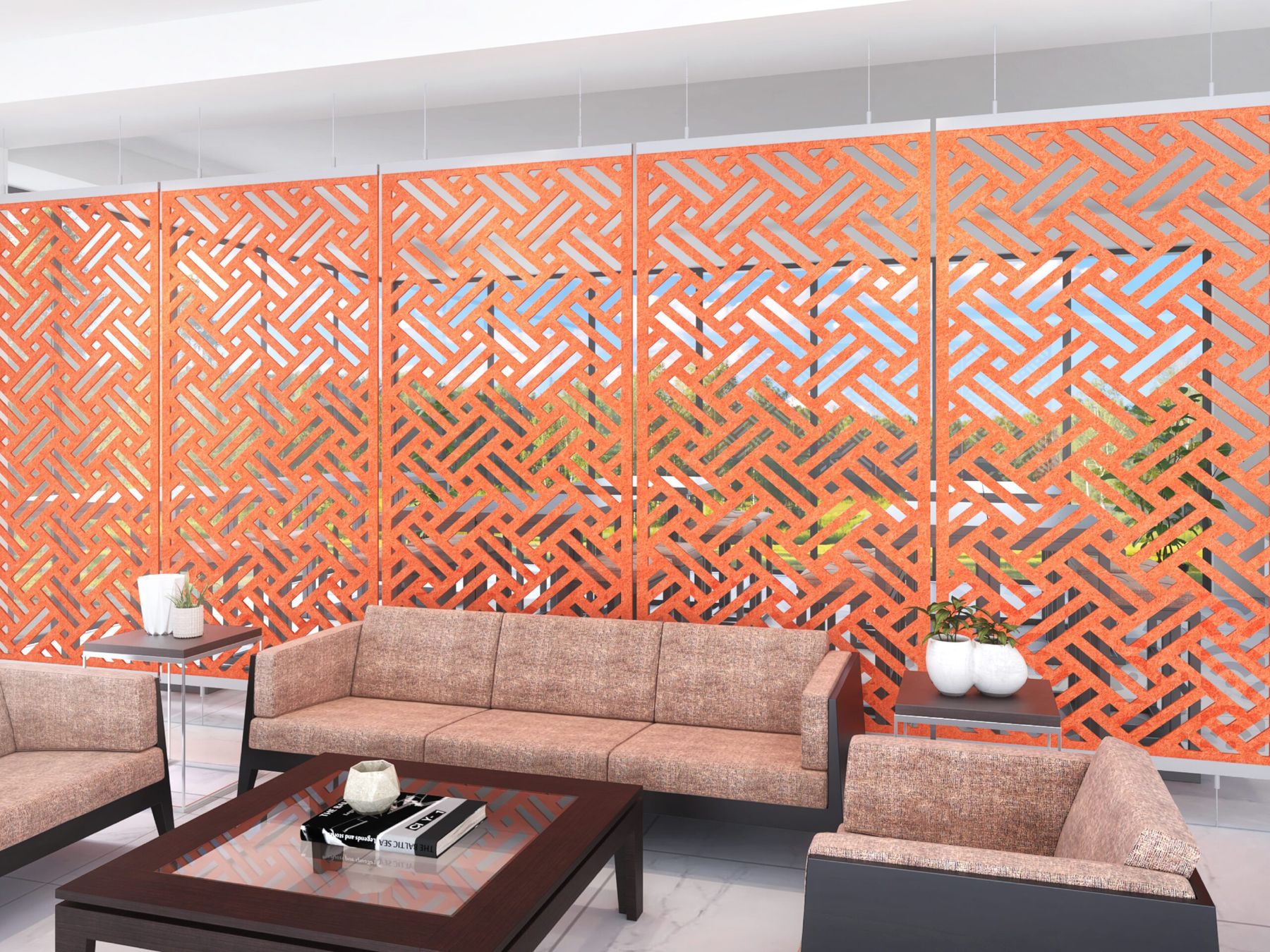 Orange lattice screen panels behind a lounge with sofas